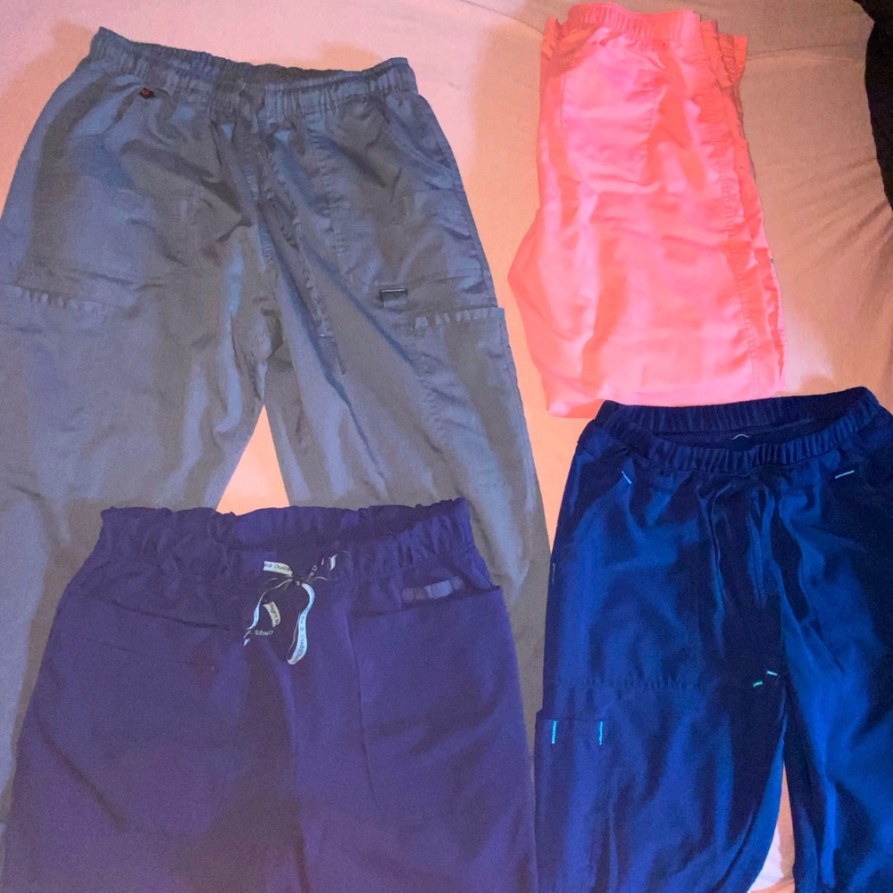 Multiple pairs of scrub pants